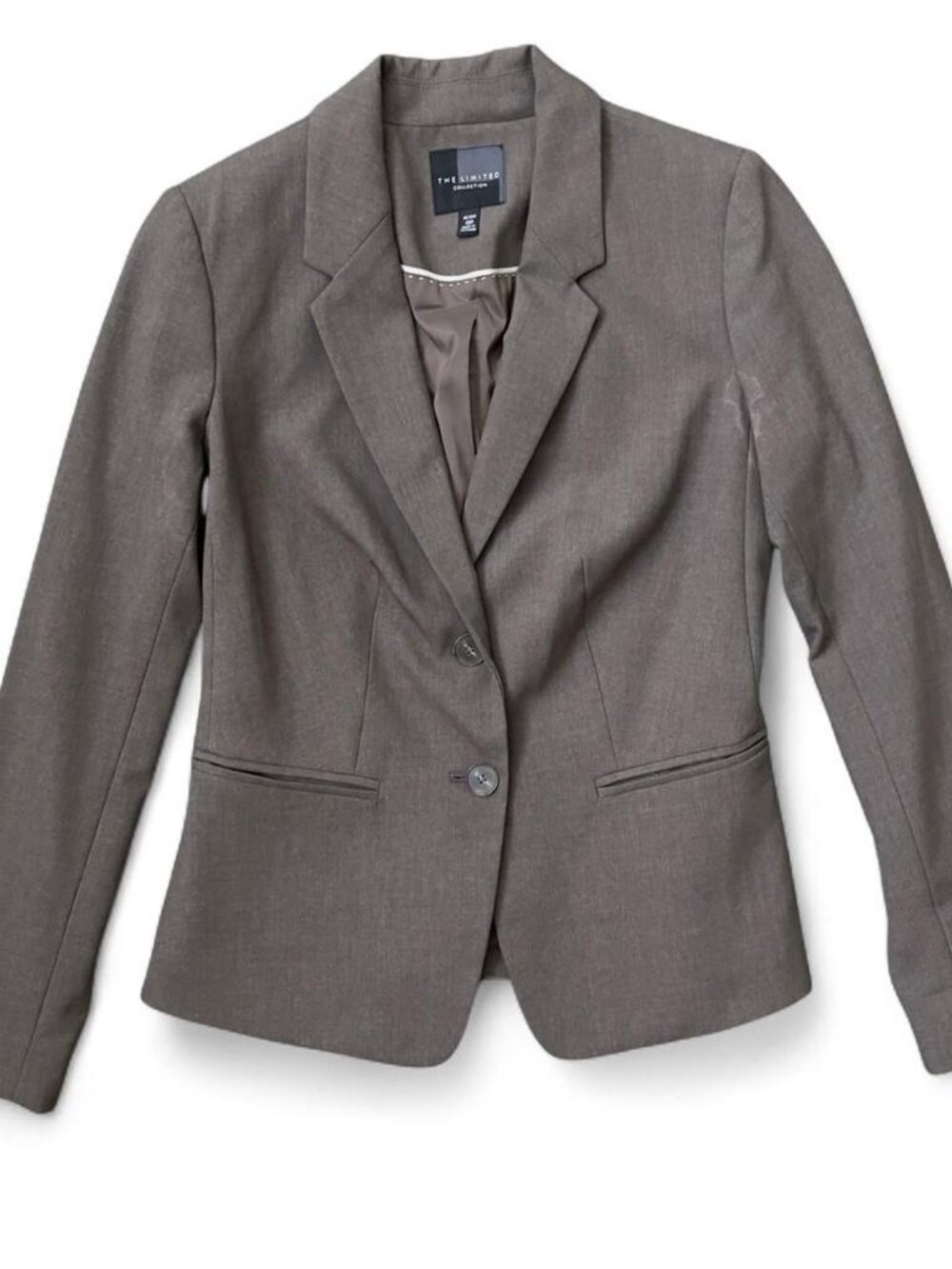 Light brown blazer with a classic fit and button closure #formalwear #blazer